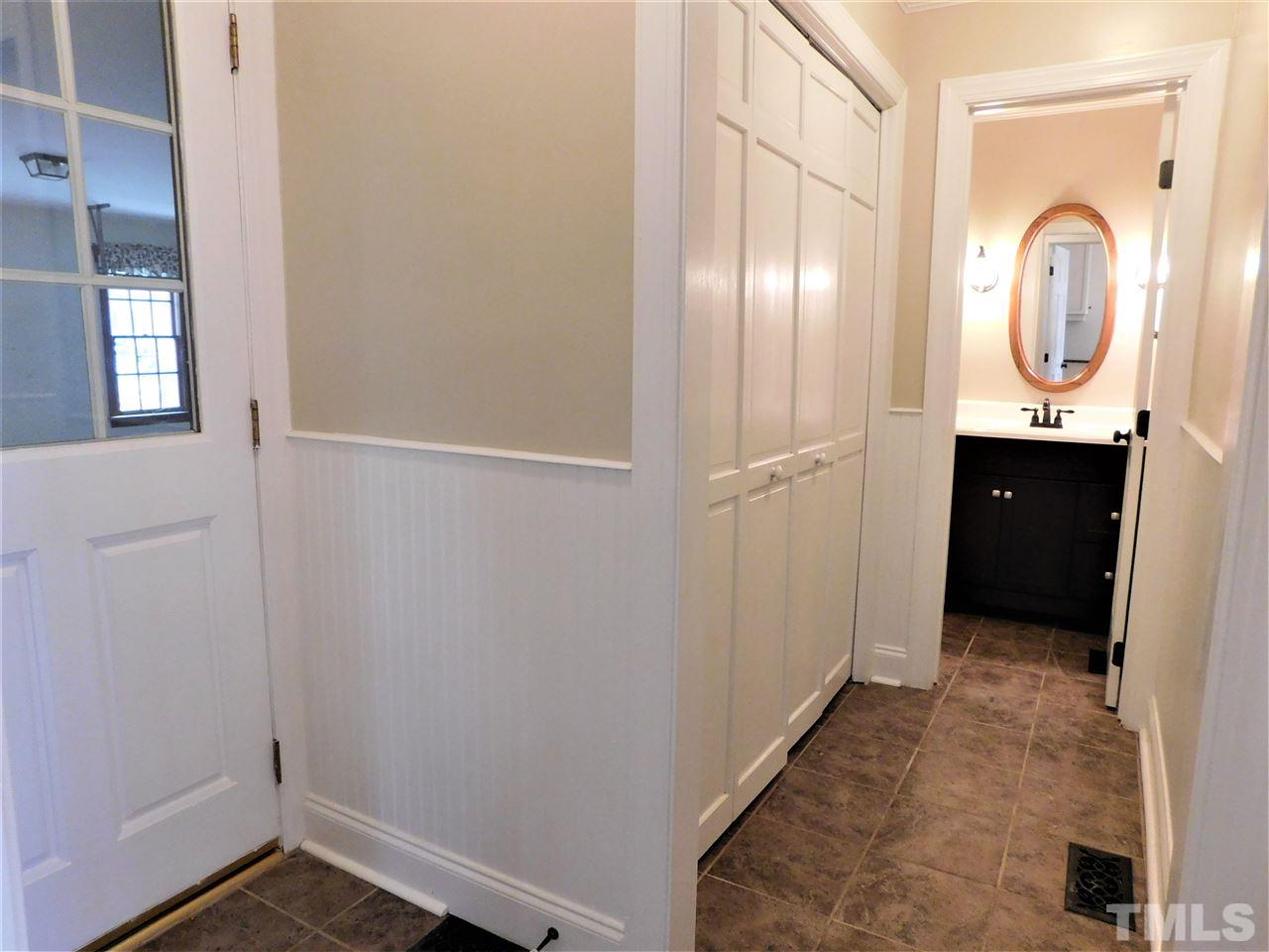 1413 Acres Way Raleigh, NC 27614 - Photo 16 of 30 Back Entrance to Half Bath and Laundry! Extra Pantry Closet too!