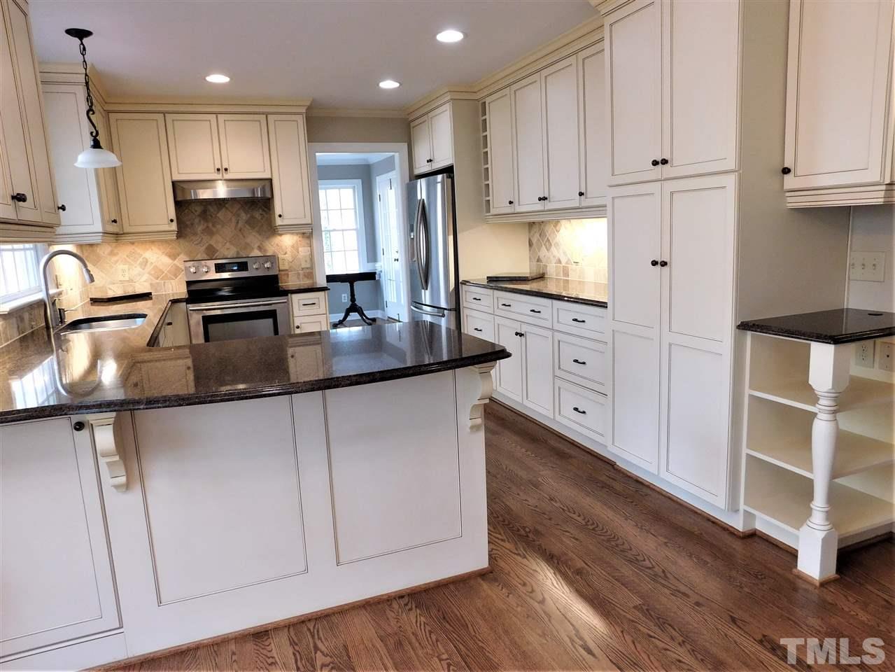 1413 Acres Way Raleigh, NC 27614 - Photo 10 of 30 Beautiful Remodeled Kitchen! Stainless Appliances,Hardwood Floors,Granite Counter tops and Pull Out Pantry Drawers!