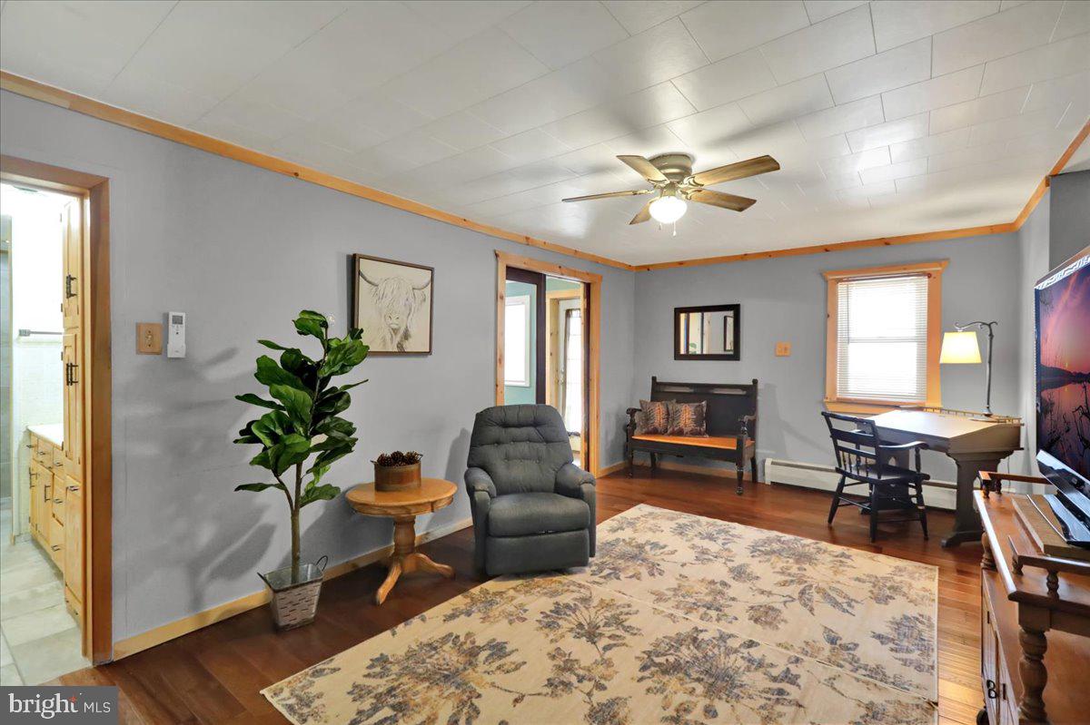 65 Mexico Road Pine Grove, PA 17963 - Photo 12 of 40 a living room with furniture a chandelier and a window