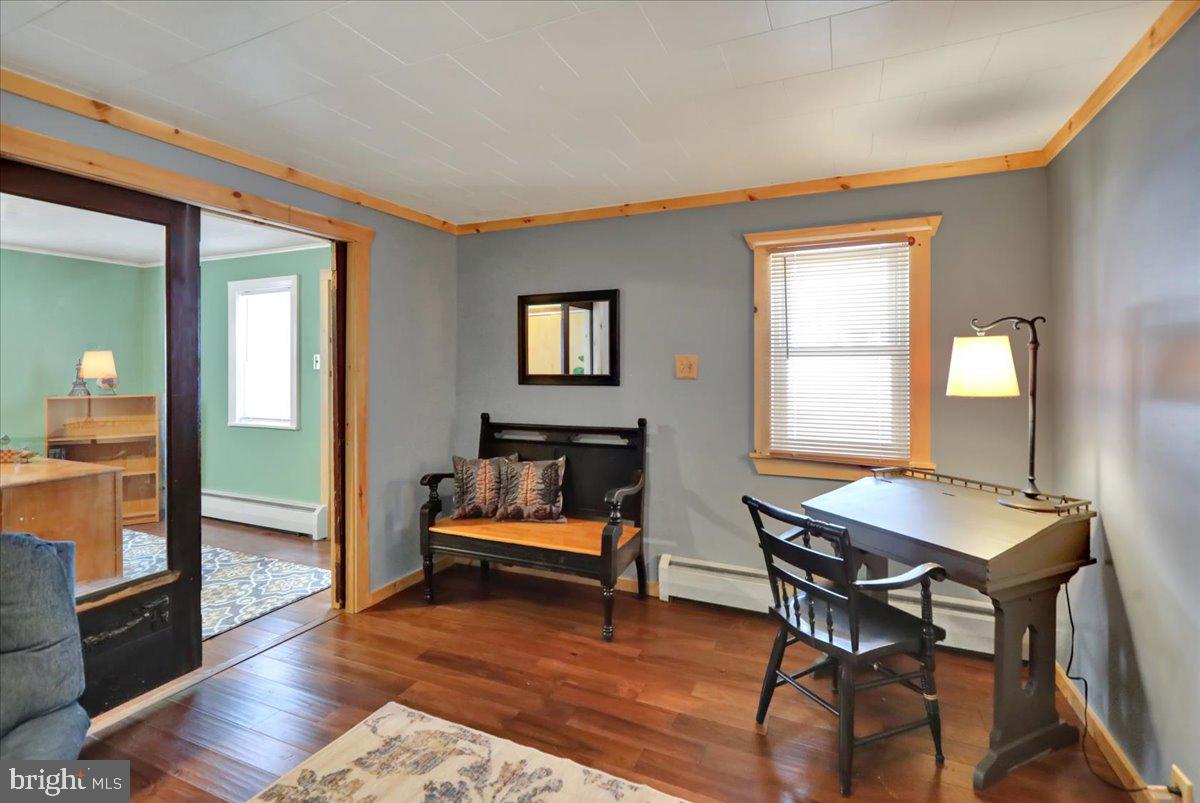 65 Mexico Road Pine Grove, PA 17963 - Photo 13 of 40 a workspace with furniture wooden floor and a window