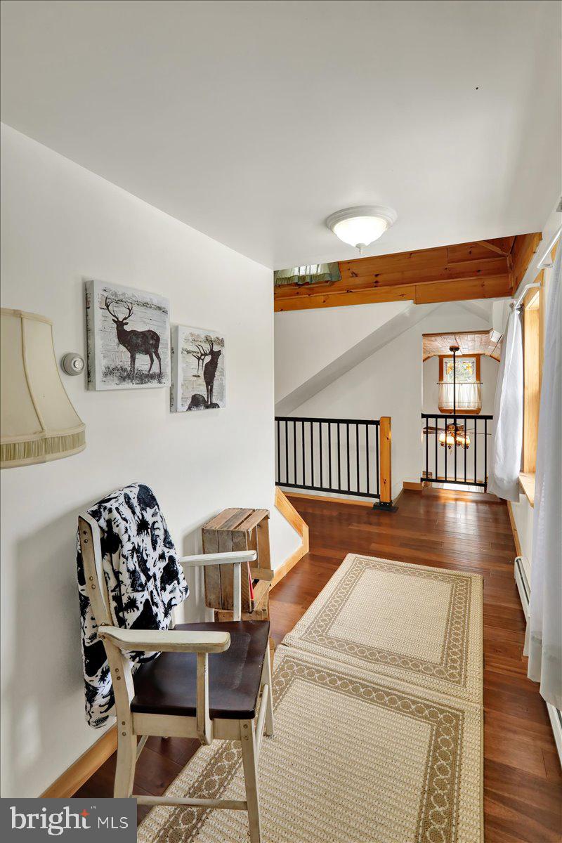 65 Mexico Road Pine Grove, PA 17963 - Photo 20 of 40 a bed room with a bed and a chair