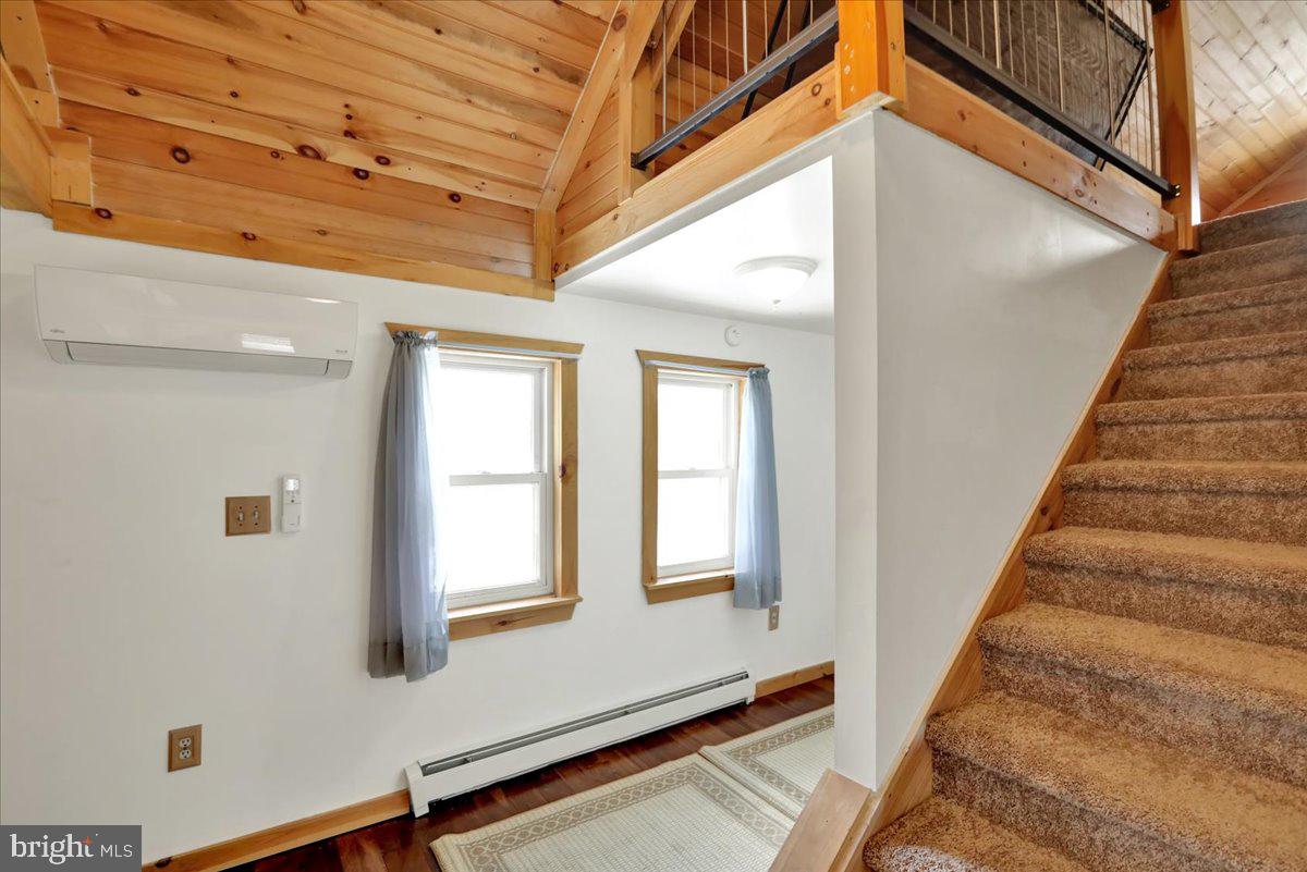 65 Mexico Road Pine Grove, PA 17963 - Photo 27 of 40 a view of staircase with white walls and a window