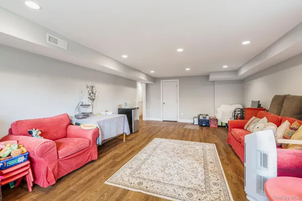 a bed room with furniture and a rug