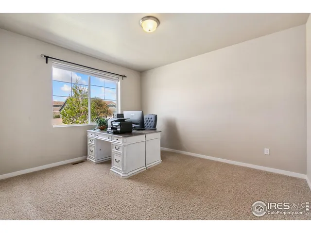 a kitchen with a window cabinets and stainless steel appliances