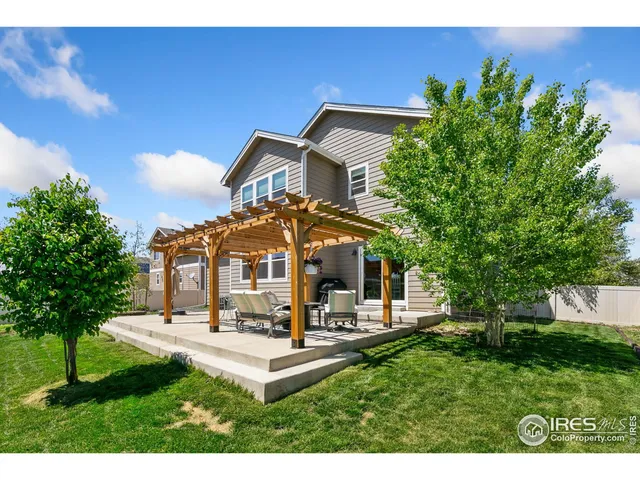 a view of a building with a yard