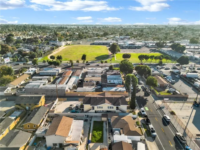 an aerial view of residential building with parking space