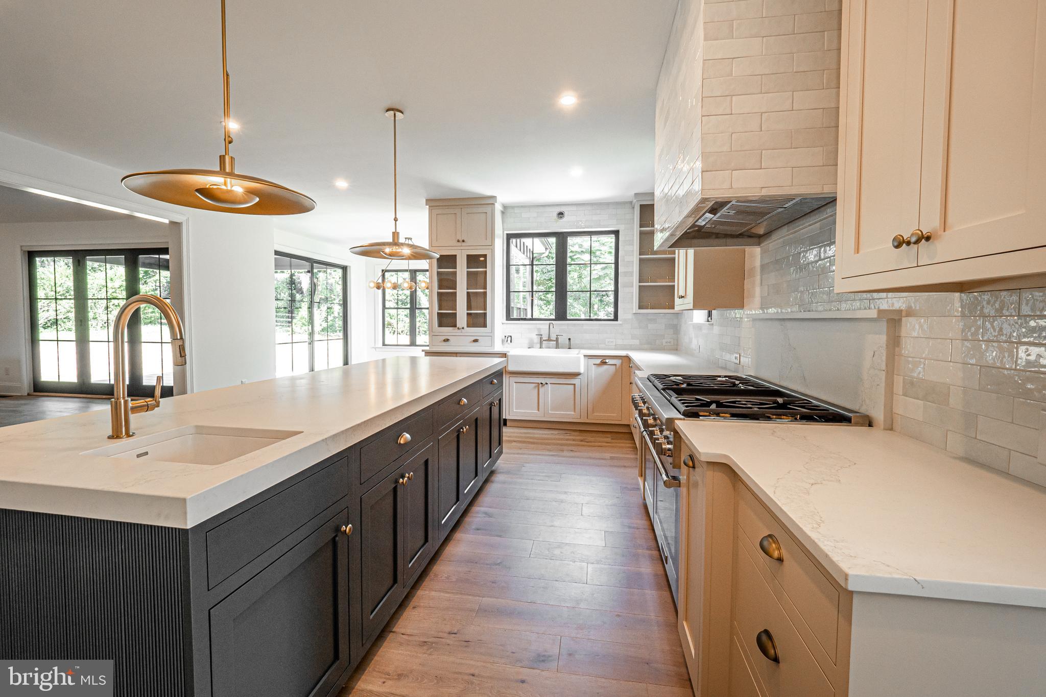 3 Timber Mill Lane, Unit SILENZIO Landenberg, PA 19350 - Photo 17 of 40 a kitchen with stainless steel appliances a sink stove and cabinets