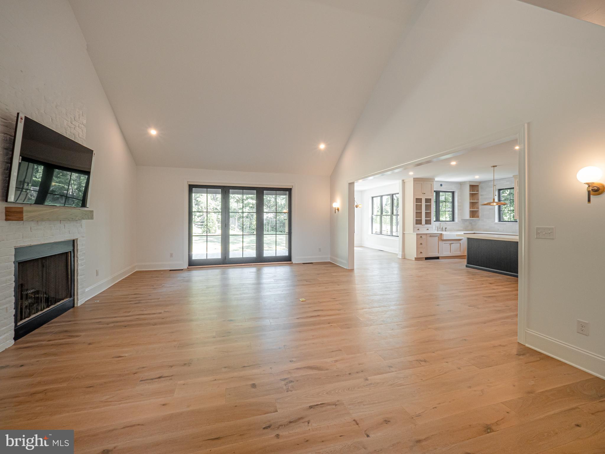 3 Timber Mill Lane, Unit SILENZIO Landenberg, PA 19350 - Photo 25 of 40 a view of a livingroom with furniture a fireplace
