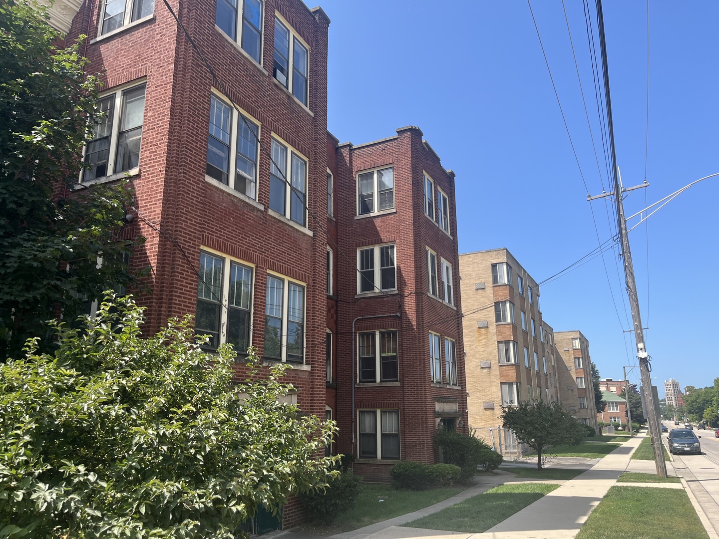 423 East Chicago Street, Unit B Elgin, IL 60120 - Photo 3 of 13 a view of a building with a yard