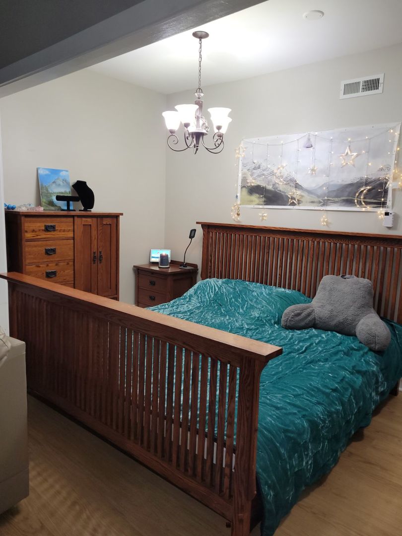 423 East Chicago Street, Unit B Elgin, IL 60120 - Photo 9 of 13 a view of a balcony with furniture