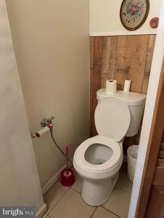 a bathroom with a toilet and a sink
