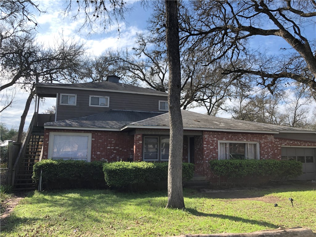 10310 Gail Road Austin, TX 78748 - Photo 1 of 1 Front of main house. see separate stairway to upstairs on left.
