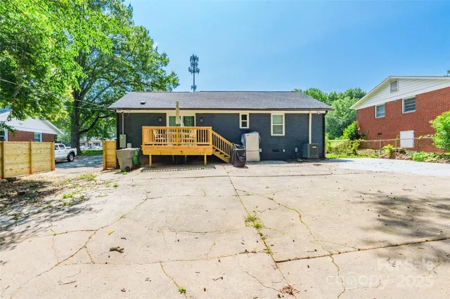 a view of a house with a snow in the yard
