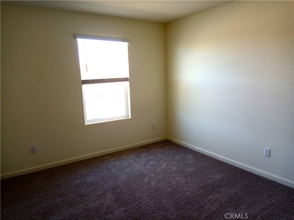 4244 Rutherford Avenue Merced, CA 95348 - Photo 12 of 23 an empty room with a window