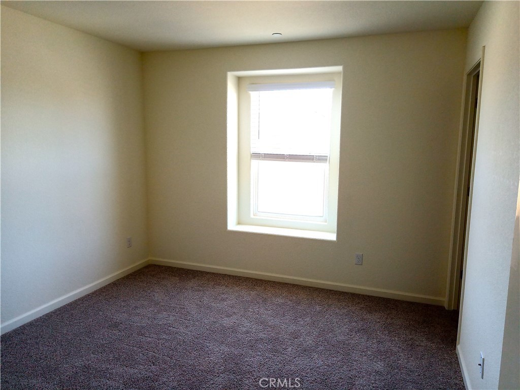 4244 Rutherford Avenue Merced, CA 95348 - Photo 13 of 23 an empty room with a window