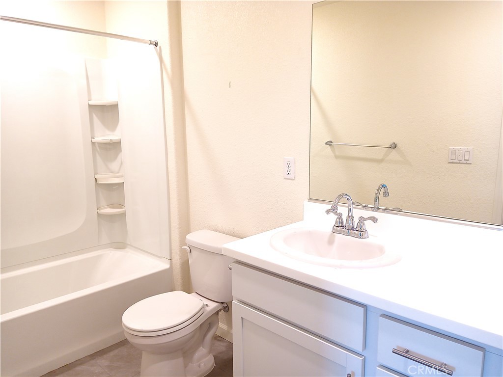 4244 Rutherford Avenue Merced, CA 95348 - Photo 15 of 23 a bathroom with a sink toilet and shower