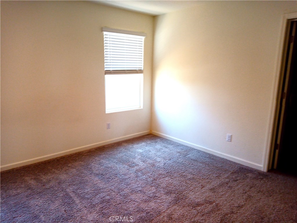 4244 Rutherford Avenue Merced, CA 95348 - Photo 16 of 23 an empty room with a window