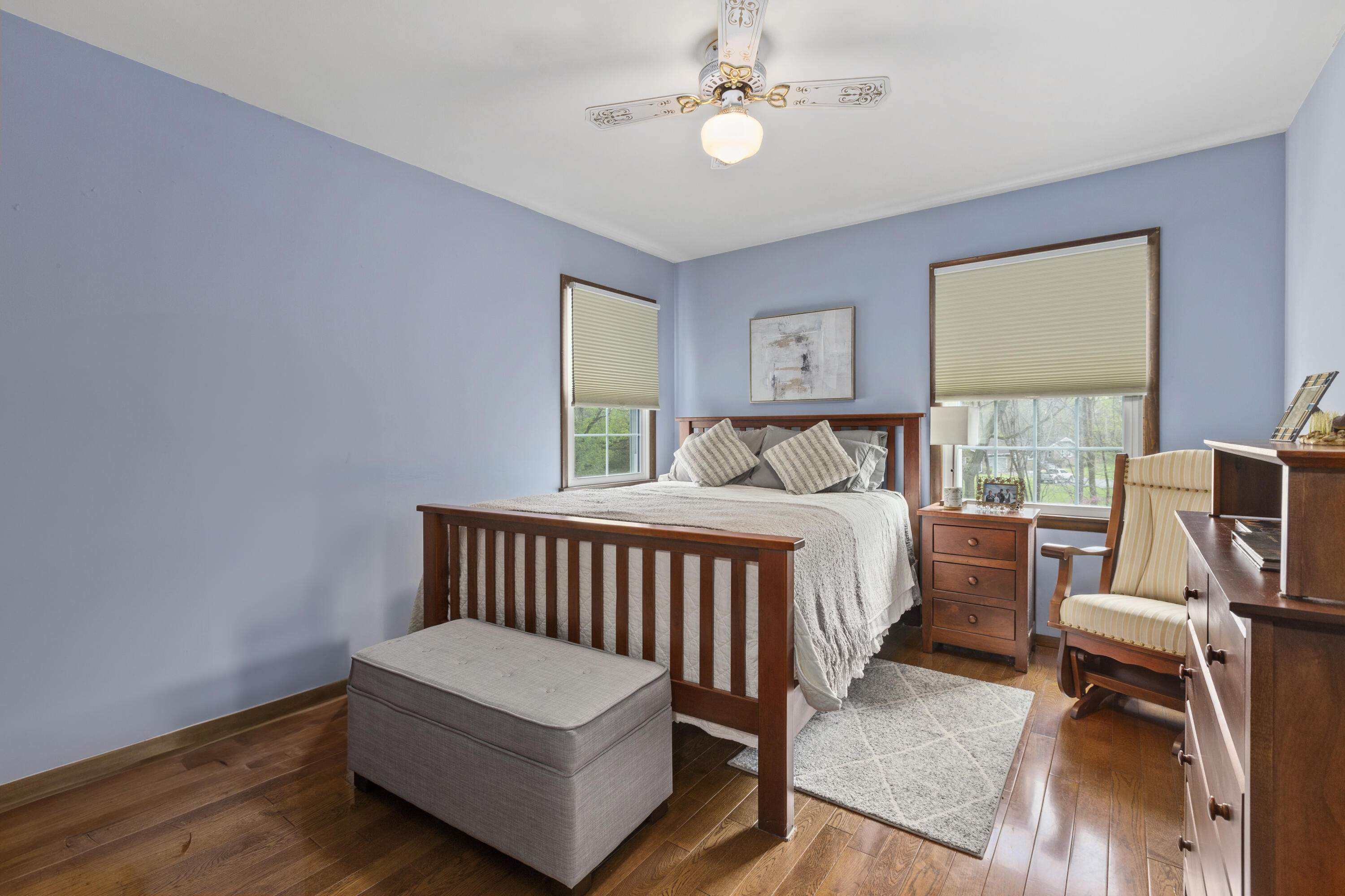 328 East Tratebas Road Valparaiso, IN 46383 - Photo 19 of 48 a bedroom with a bed wooden floor and window