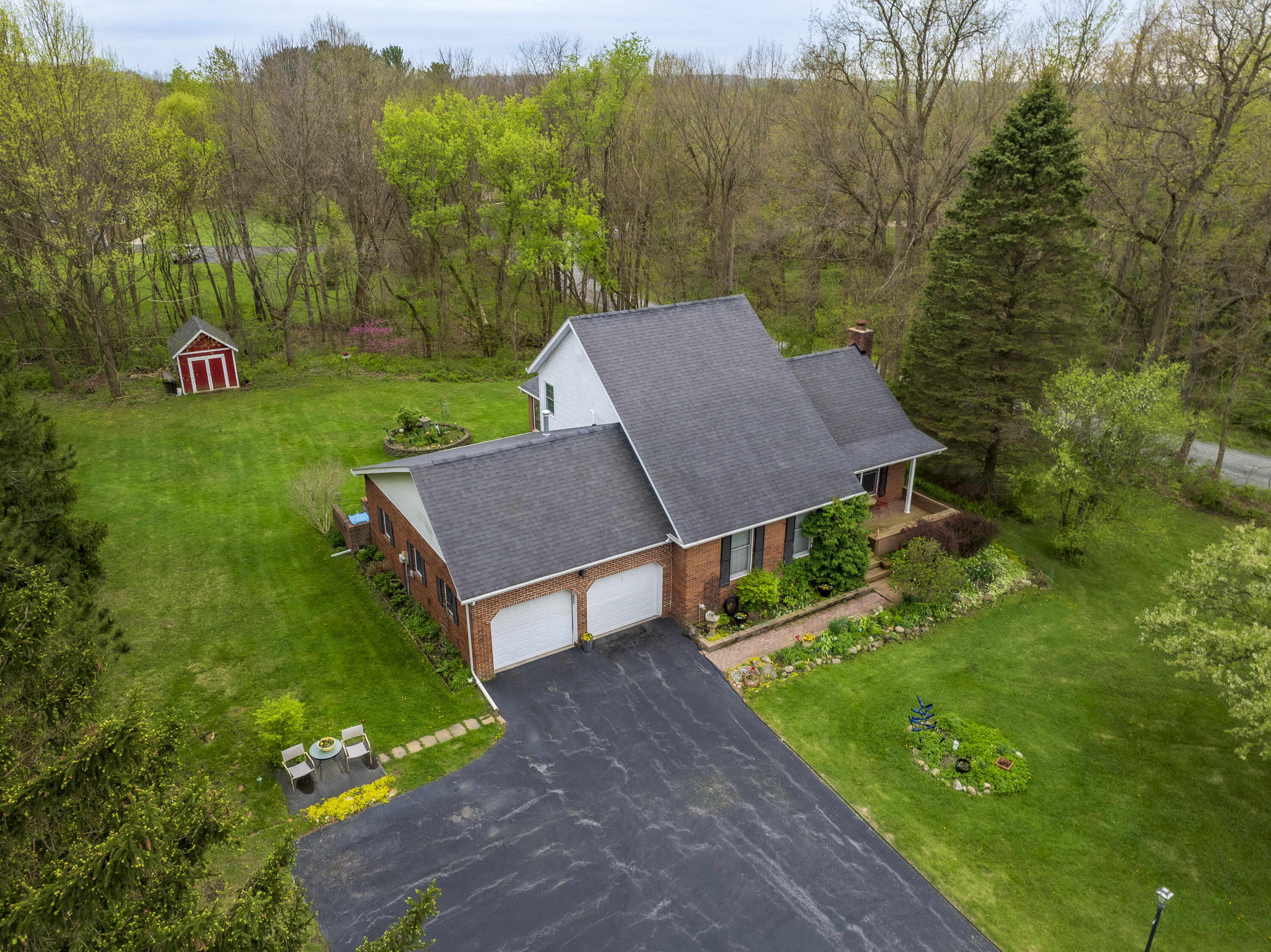 328 East Tratebas Road Valparaiso, IN 46383 - Photo 31 of 48 a view of a house with a yard