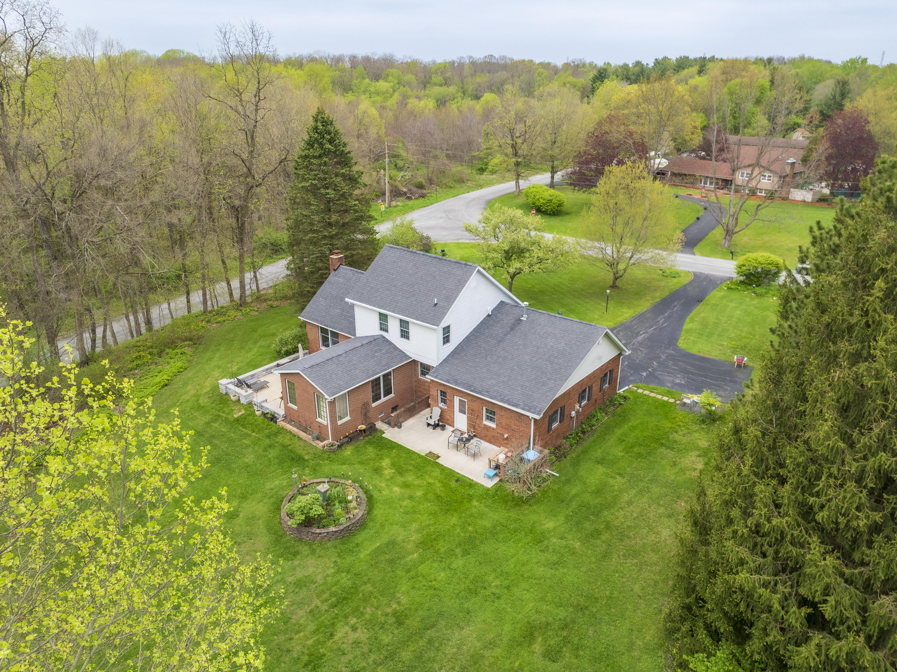 328 East Tratebas Road Valparaiso, IN 46383 - Photo 32 of 48 an aerial view of a house with garden space and outdoor seating