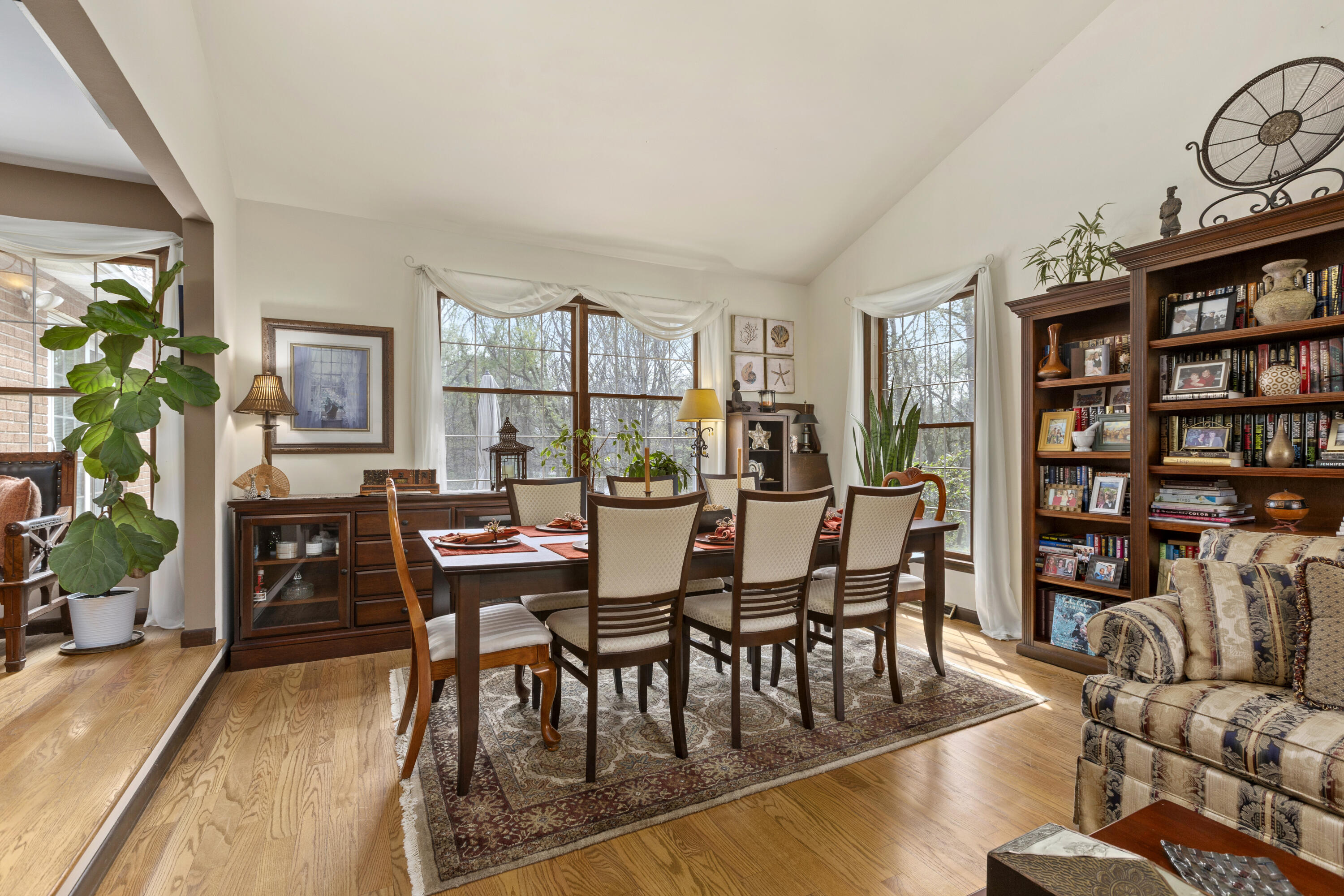 328 East Tratebas Road Valparaiso, IN 46383 - Photo 7 of 48 a view of a dining room with furniture window and wooden floor