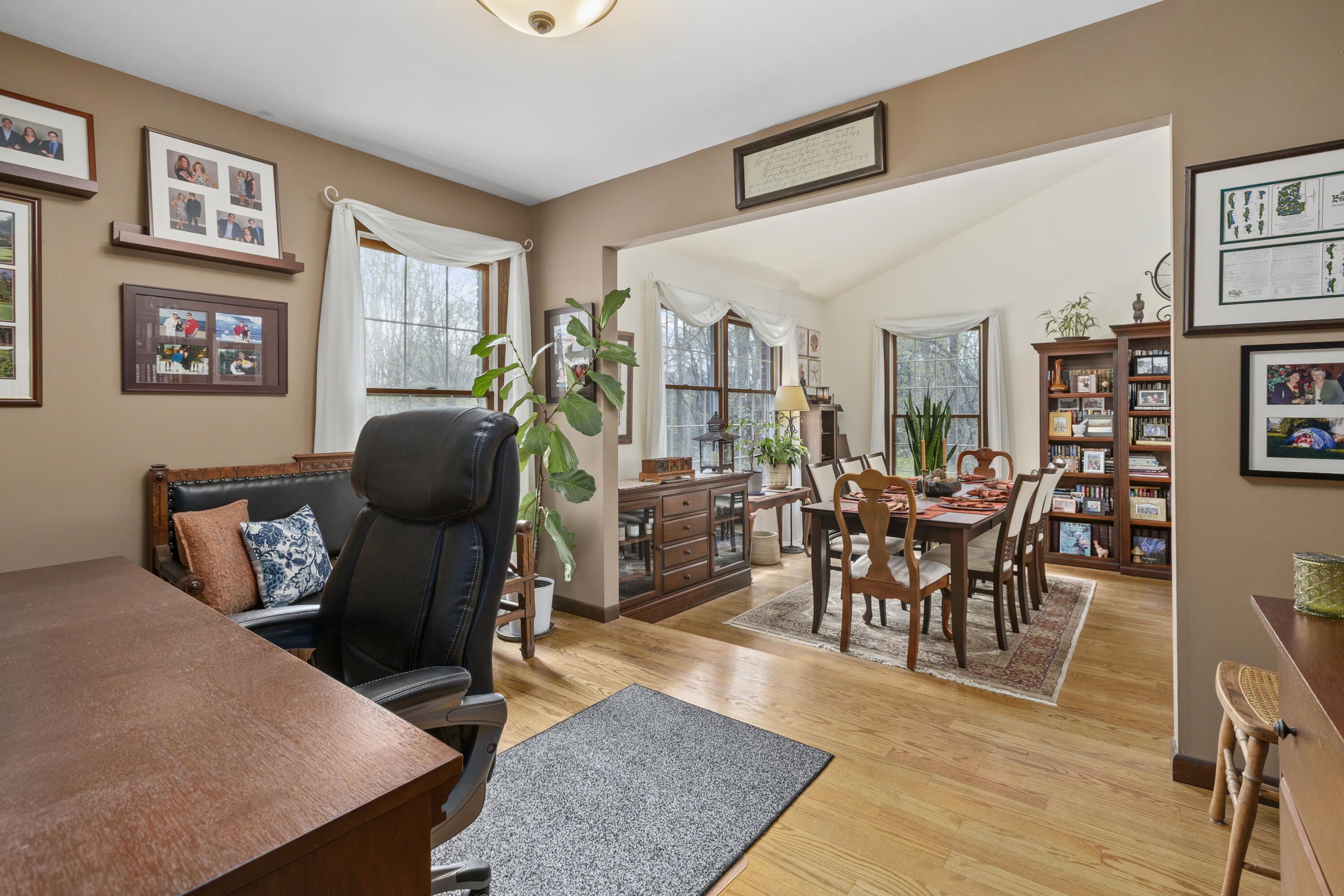 328 East Tratebas Road Valparaiso, IN 46383 - Photo 8 of 48 a living room with furniture and a dining table