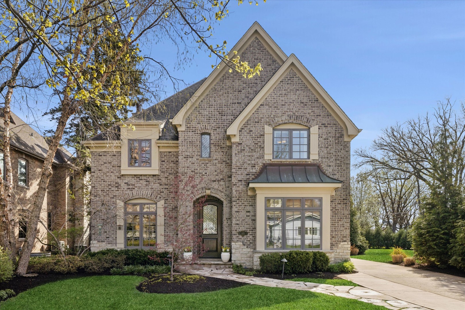 front view of a house with a yard