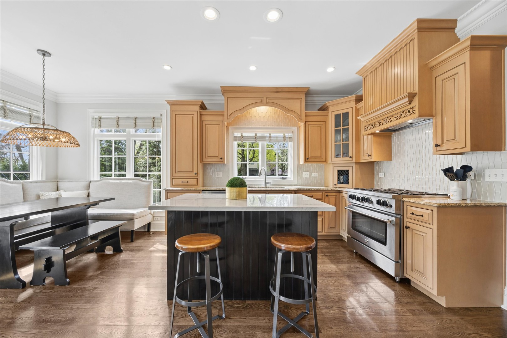 405 Phillippa Street Hinsdale, IL 60521 - Photo 16 of 44 a kitchen with stainless steel appliances granite countertop a stove top oven a sink dishwasher and white cabinets with wooden floor