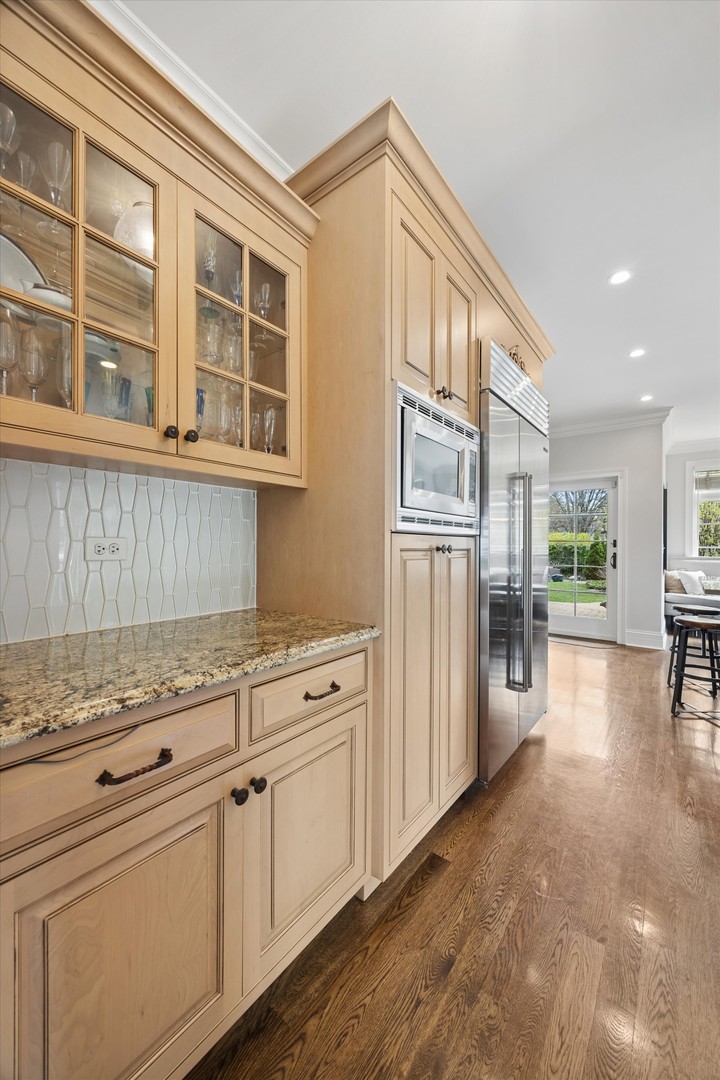405 Phillippa Street Hinsdale, IL 60521 - Photo 19 of 44 a kitchen with granite countertop cabinets and refrigerator