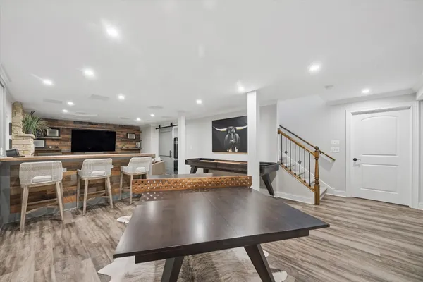 a black white and white photo of a living room