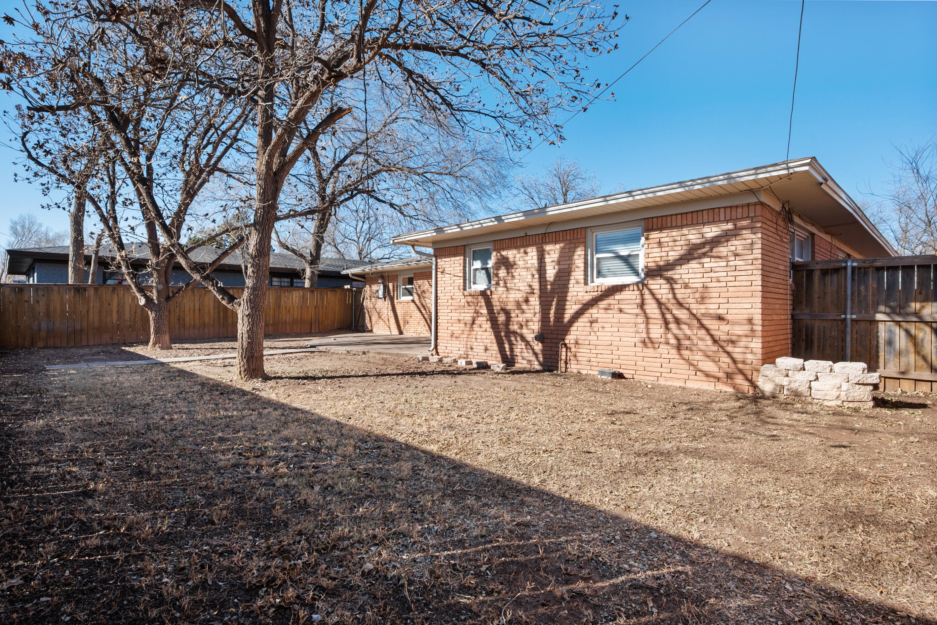 2509 61st Street Lubbock, TX 79413 - Photo 20 of 21 a view of a backyard of the house