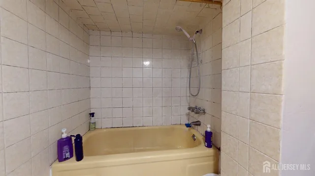 a bathroom with a bathtub
