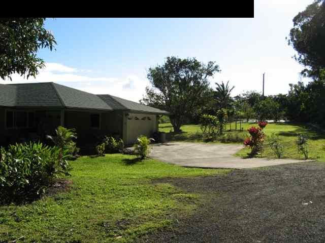 21 Awalau Road Haiku, HI 96708 - Photo 14 of 30 a view of a house with backyard and sitting area