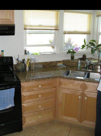 21 Awalau Road Haiku, HI 96708 - Photo 20 of 30 a kitchen with a sink and large window