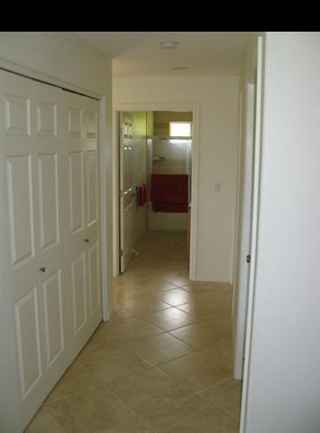 21 Awalau Road Haiku, HI 96708 - Photo 21 of 30 a view of a hallway with wooden floor