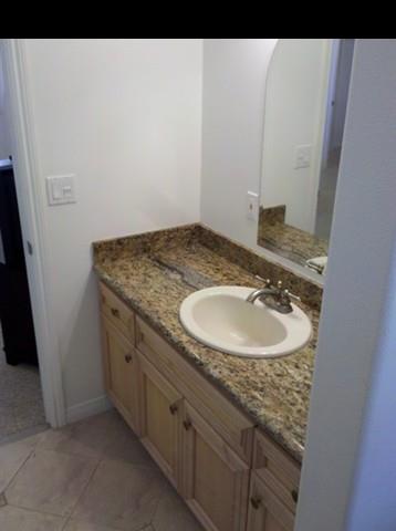 21 Awalau Road Haiku, HI 96708 - Photo 29 of 30 a bathroom with a sink and a mirror