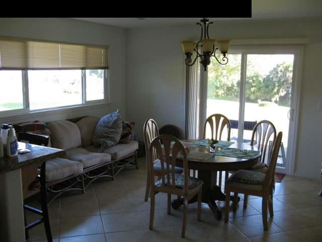 21 Awalau Road Haiku, HI 96708 - Photo 9 of 30 a view of a dining room with furniture window and outside view