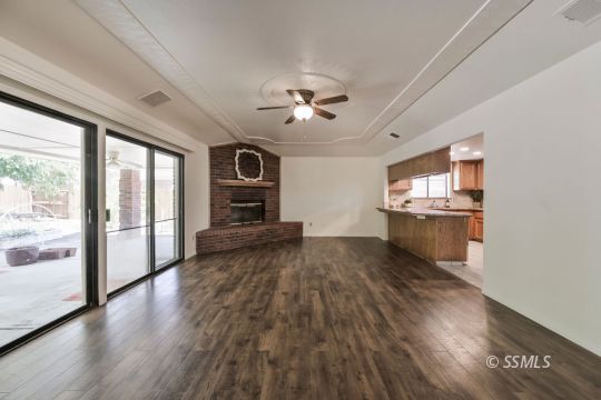 1257 Carolyn Street Ridgecrest, CA 93555 - Photo 11 of 42 a view of kitchen and hall with wooden floor