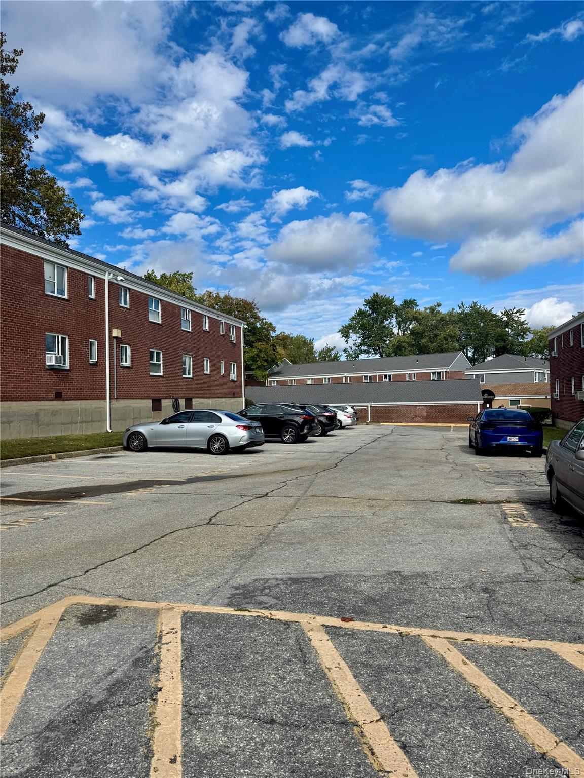 224-20 Manor Road, Unit 91 Queens, NY 11427 - Photo 15 of 17 a view of a street with cars