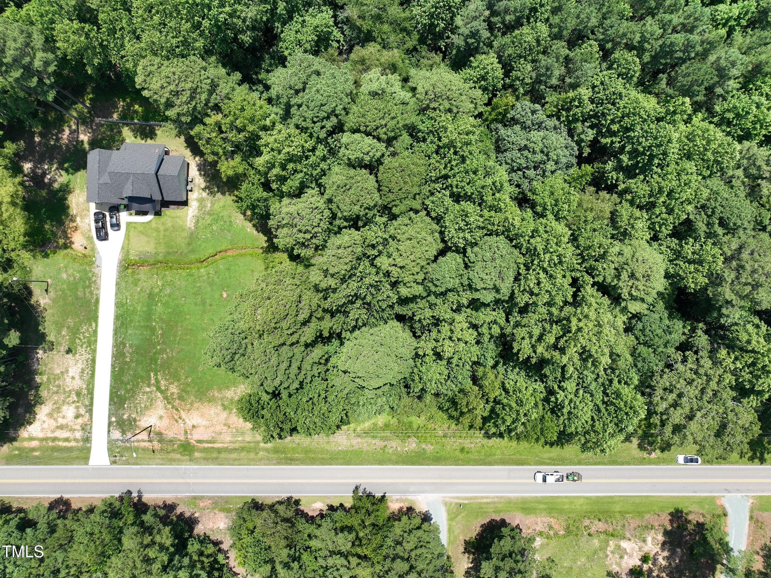 0 Carbonton Road Sanford, NC 27330 - Photo 3 of 8 a view of a yard with a fountain