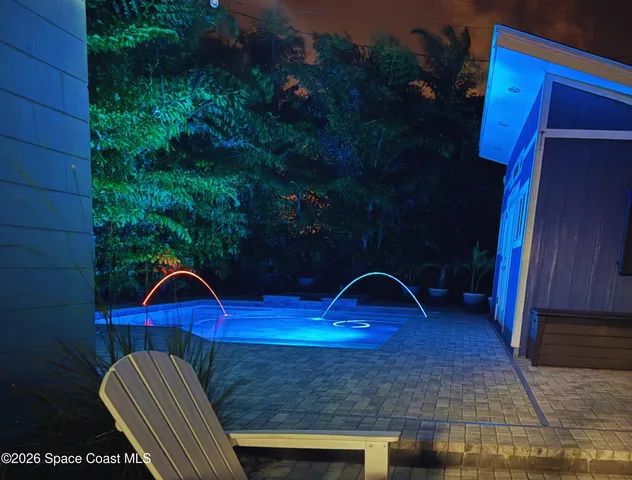 a backyard of a house with seating space