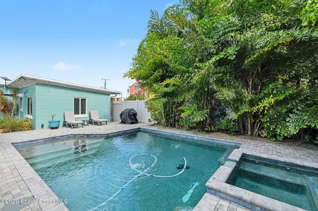 a view of a house with swimming pool