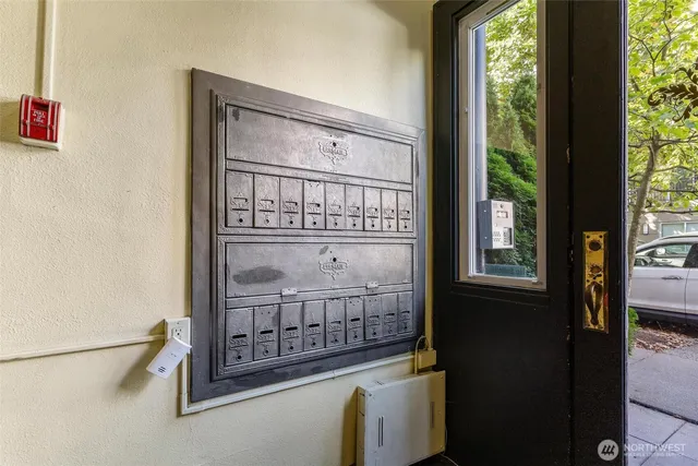 a view of entryway with a small yard