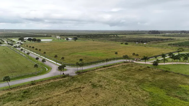 a view of a lake with a big yard