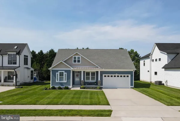 front view of a house with a patio