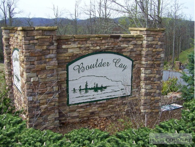Lot 5 Sunset Ridge Drive Boone, NC 28607 - Photo 1 of 3 a sign on the side of a building