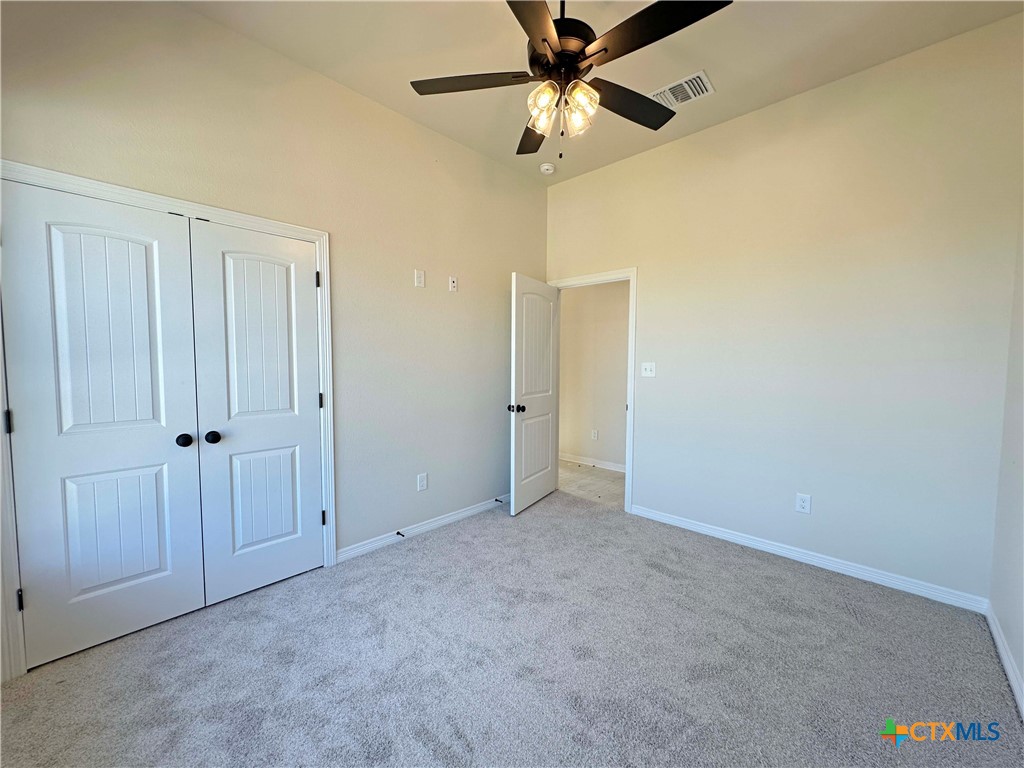 1113 Alice Circle Temple, TX 76502 - Photo 21 of 21 an empty room with a ceiling fan and a fan