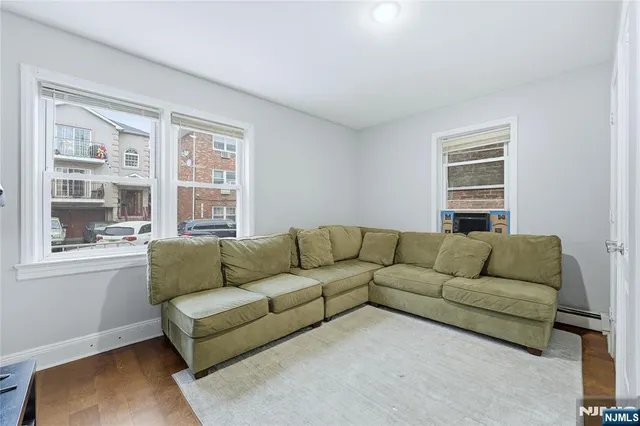 a kitchen with stainless steel appliances a sink stove and refrigerator