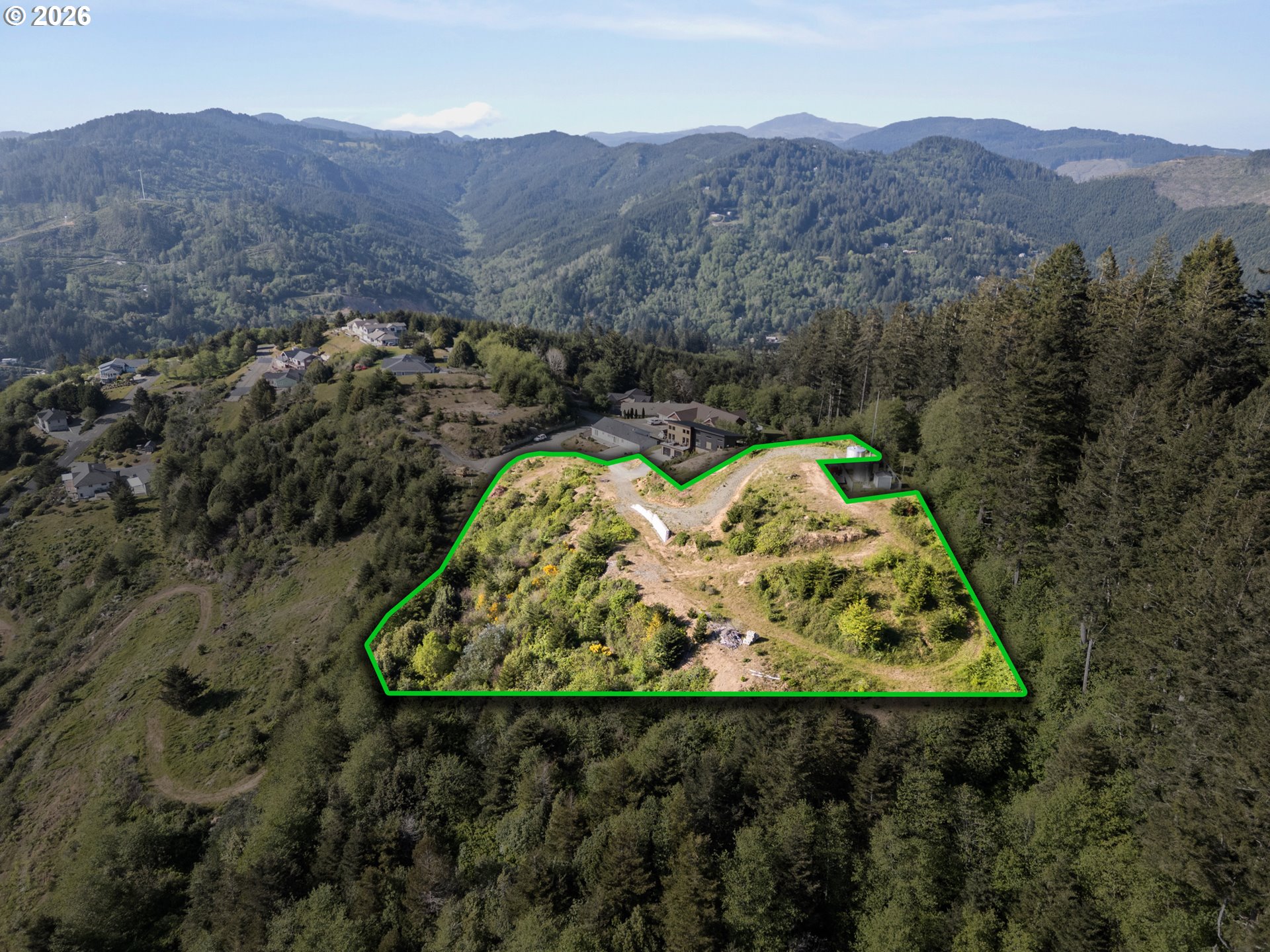 Jodel Court, Unit 2 Brookings, OR 97415 - Photo 1 of 14 an aerial view of a house