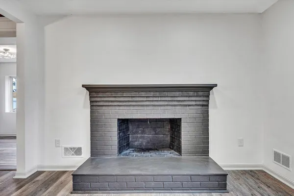 a living room with a fireplace